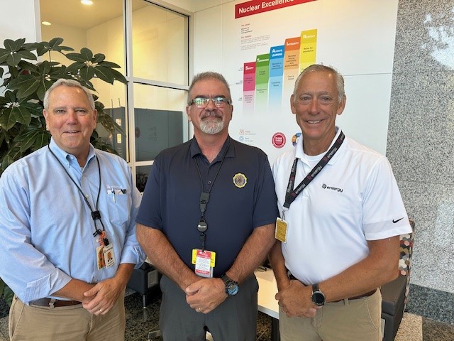 Left to right in photo: Bob Franssen, VP major fleet projects; Glenn Hoilman; Michael Rutkoske, senior manager, project controls